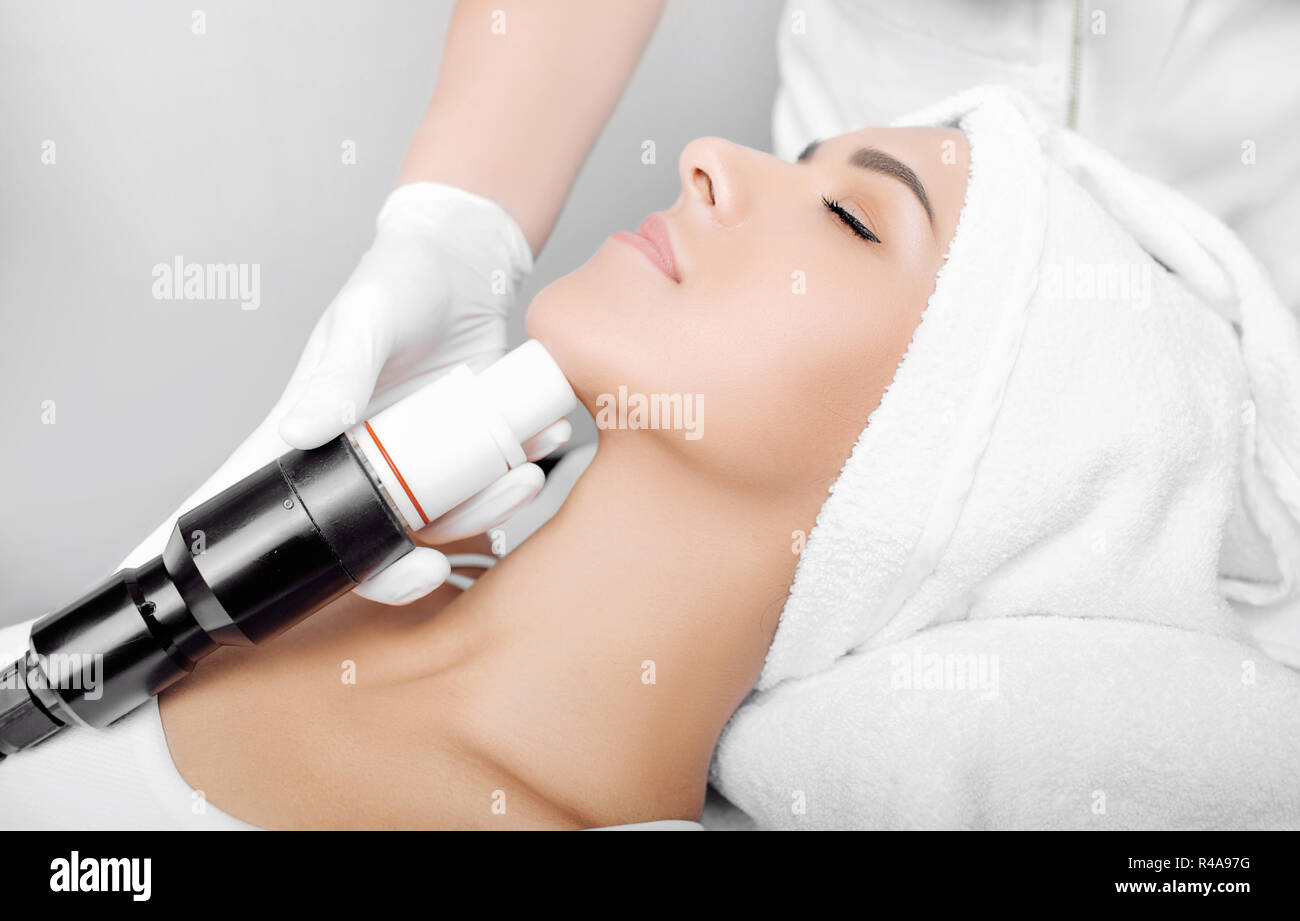 procedure wrinkle treatment , acoustic wave therapy on face Stock Photo