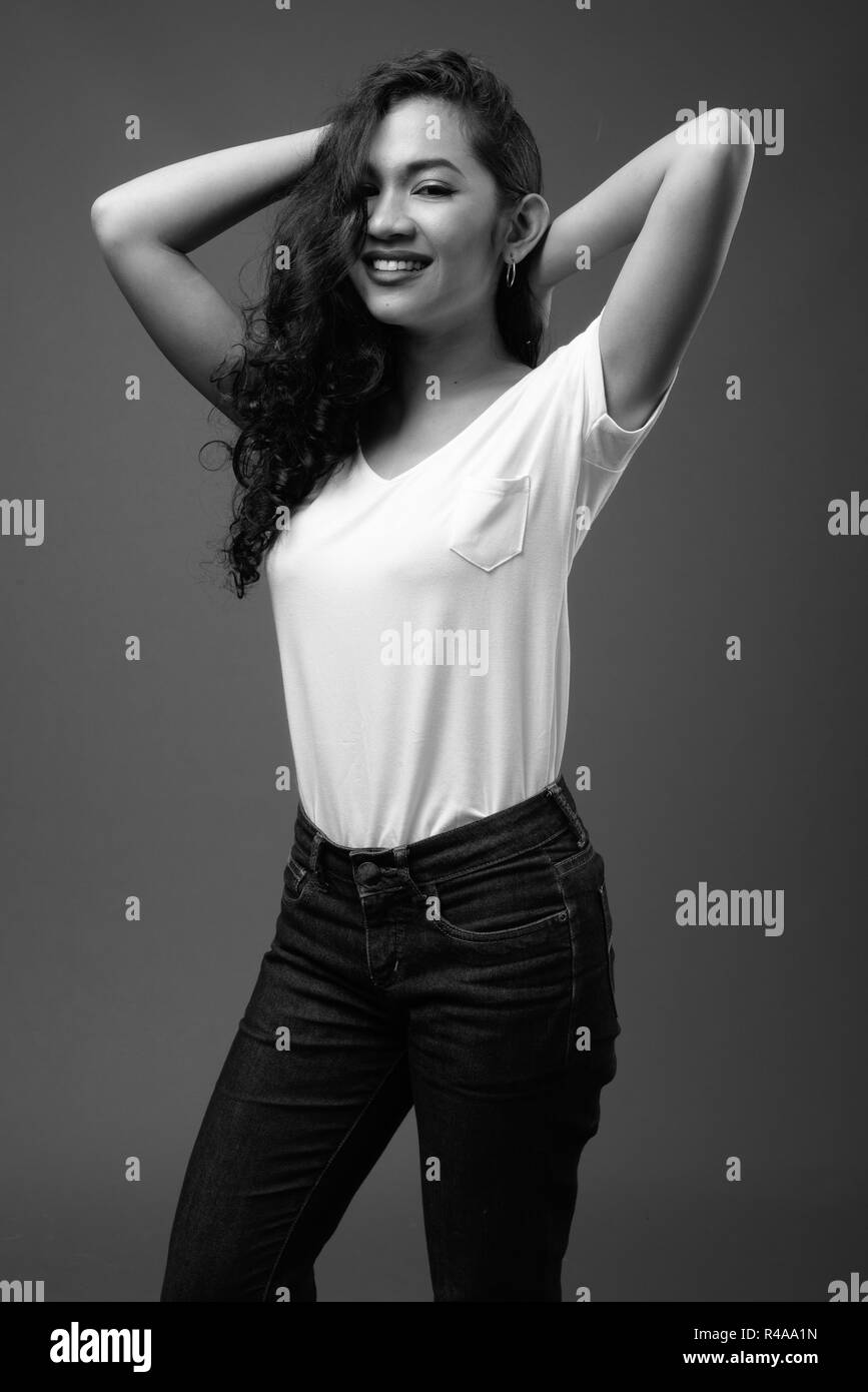 Young beautiful Asian woman studio portrait in black and white Stock ...