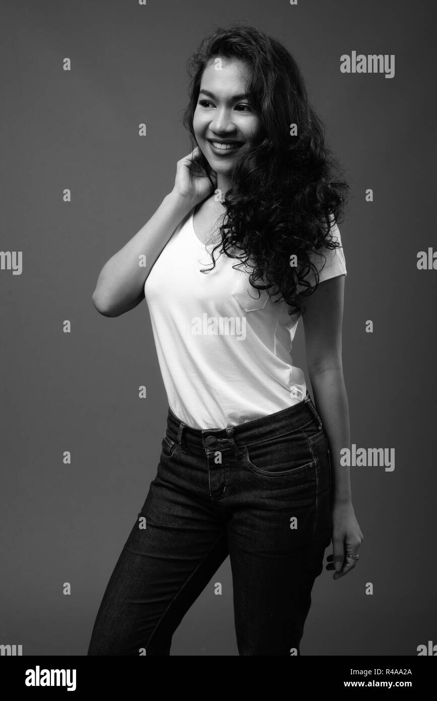 Young beautiful Asian woman studio portrait in black and white Stock ...