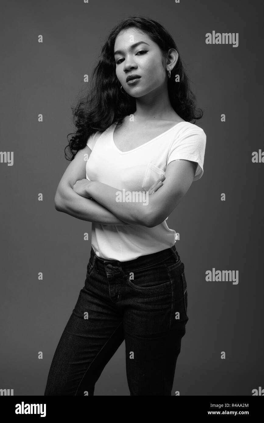 Young beautiful Asian woman studio portrait in black and white Stock ...