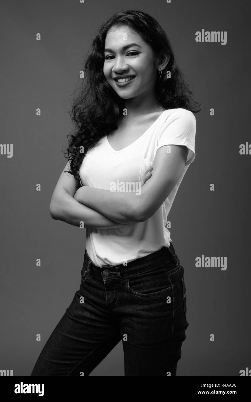 Young beautiful Asian woman studio portrait in black and white Stock ...