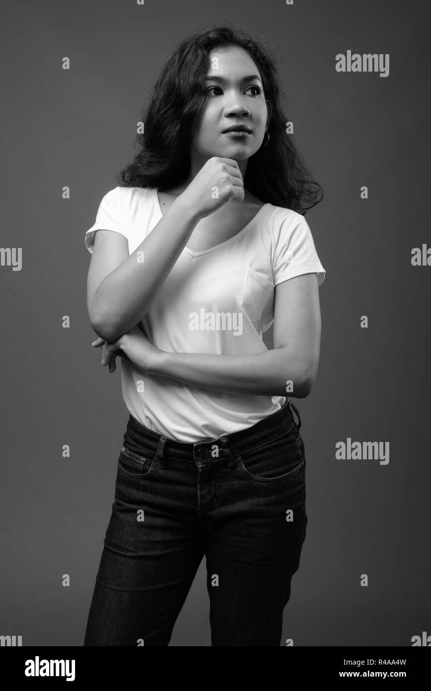 Young beautiful Asian woman studio portrait in black and white Stock ...