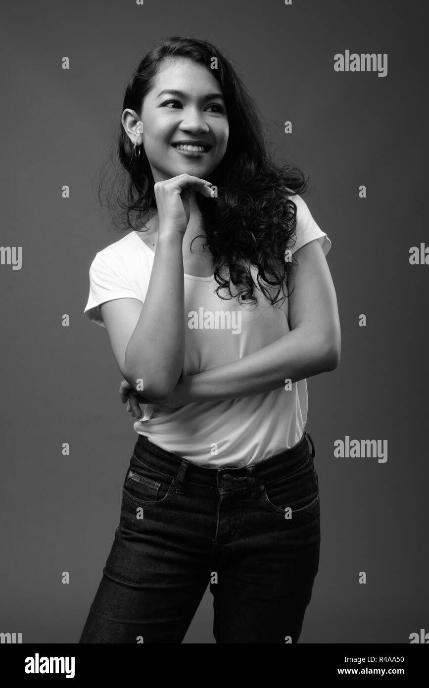 Young beautiful Asian woman studio portrait in black and white Stock ...