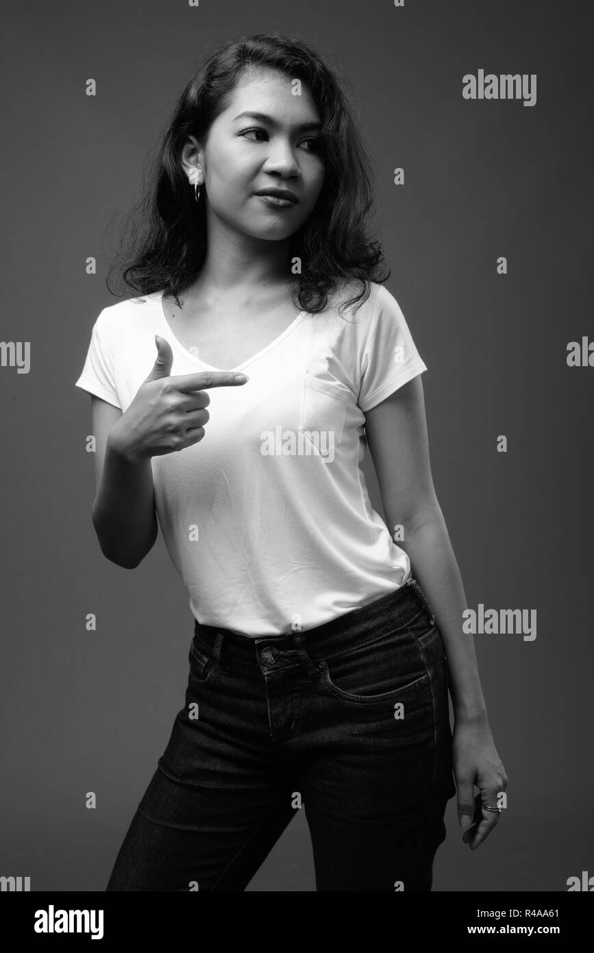 Young beautiful Asian woman studio portrait in black and white Stock ...