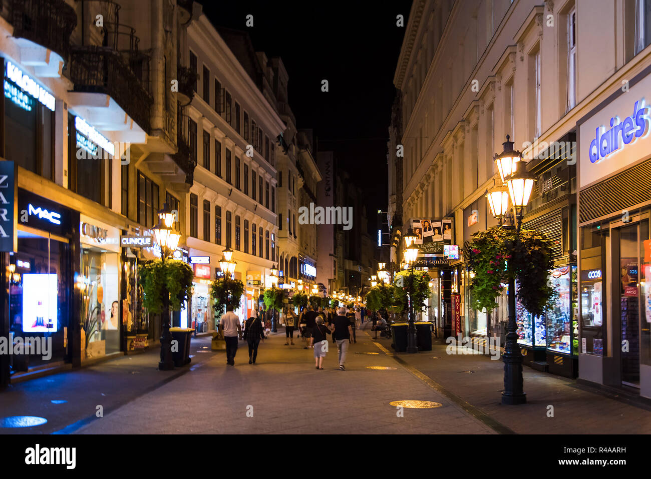 Budapest, Hungary - August 16, 2018: Downtown Budapest pedestrian walking area with many people exploring the city by night Stock Photo