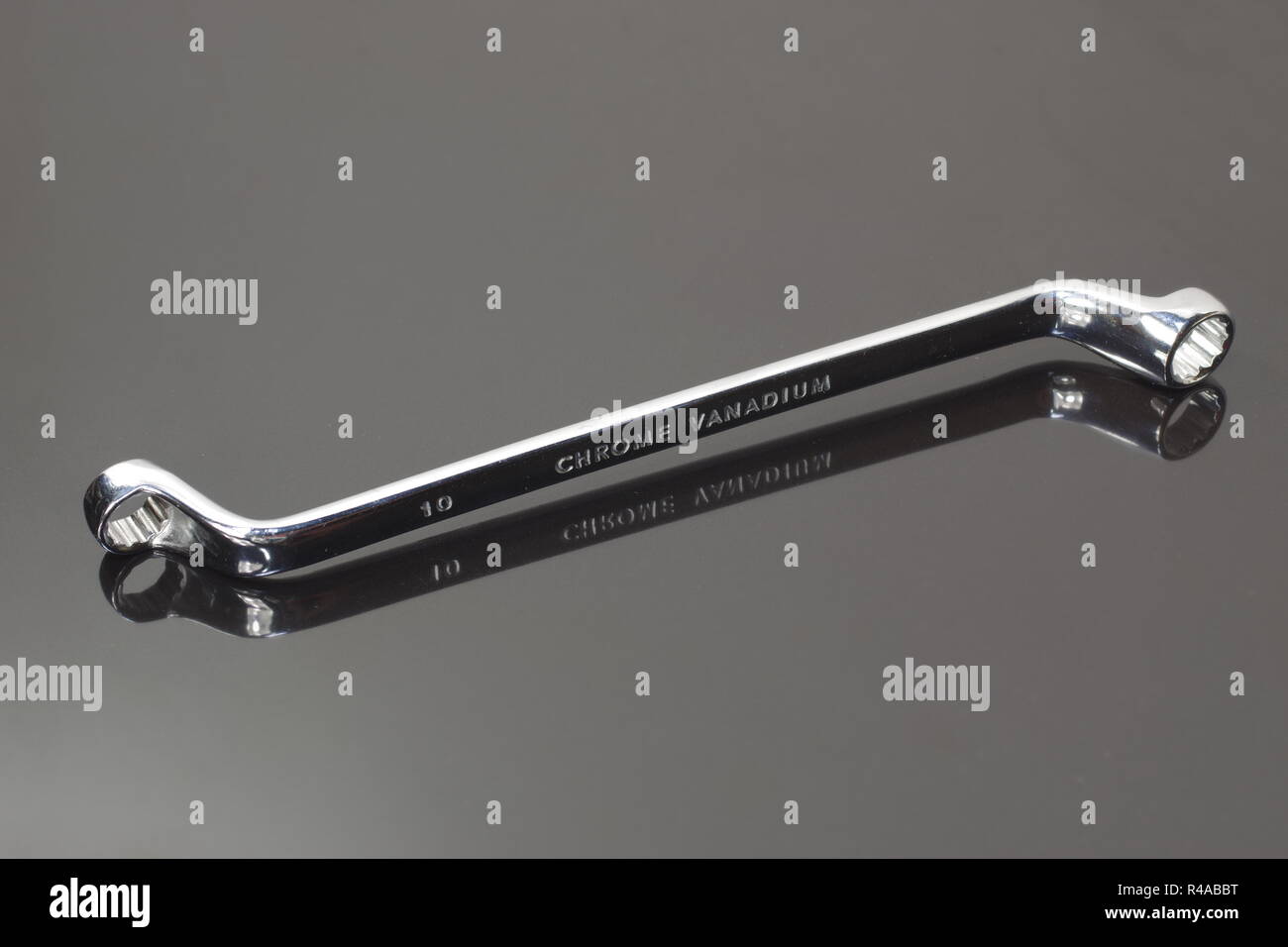 ring profile matal spanner on dark background Stock Photo