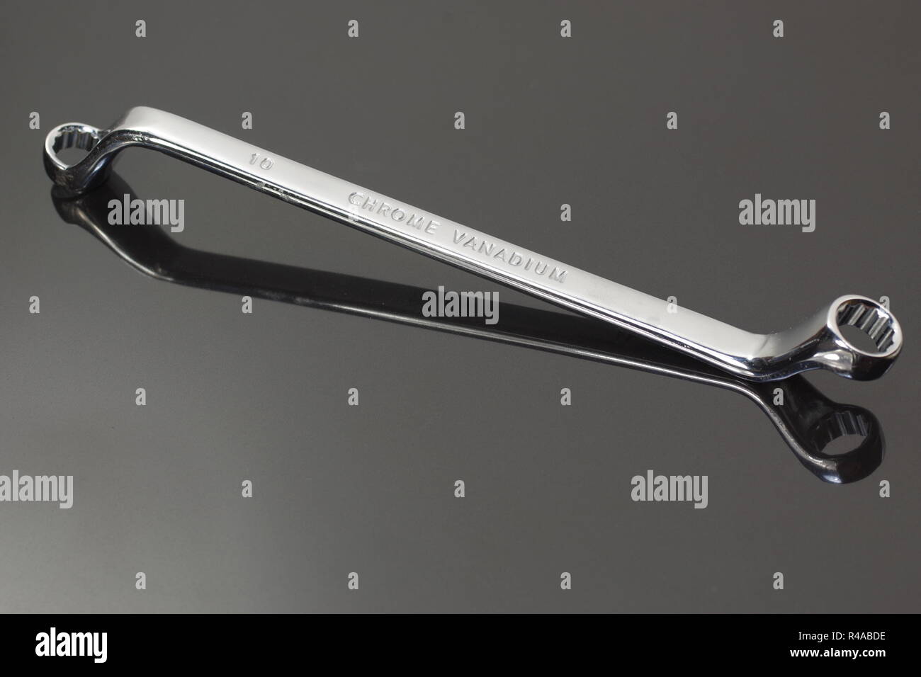 ring profile matal spanner on dark background Stock Photo