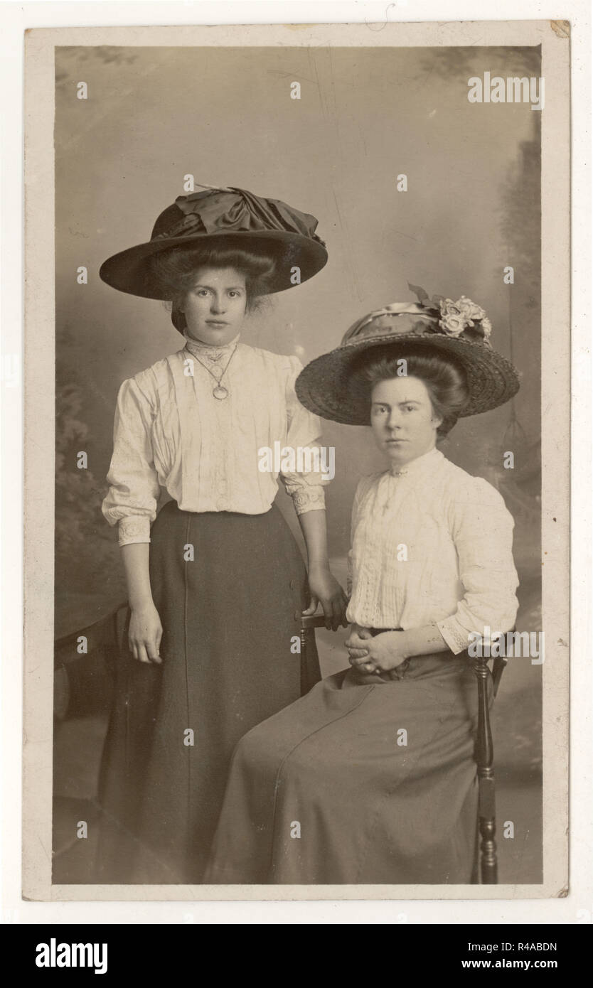 Original Edwardian postcard portrait of a young lady called Prue and perhaps her sister, Edwardian ladies, Urmston, Greater Manchester, U.K. circa 1909, 1910 Stock Photo
