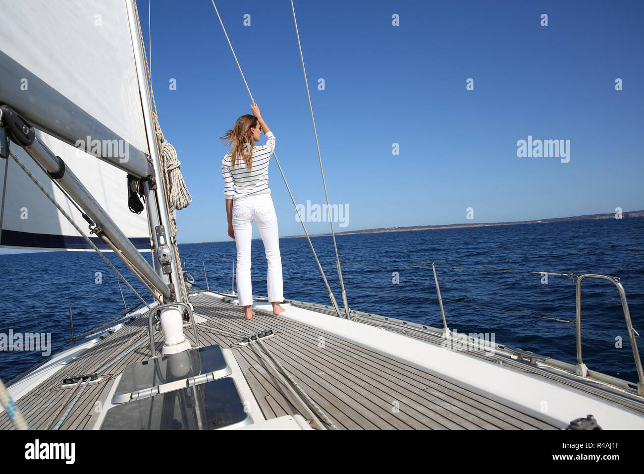 Girl standing on boat deck hi-res stock photography and images - Alamy