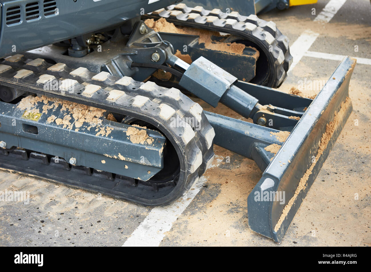 Crawler mini tractor with loader Stock Photo
