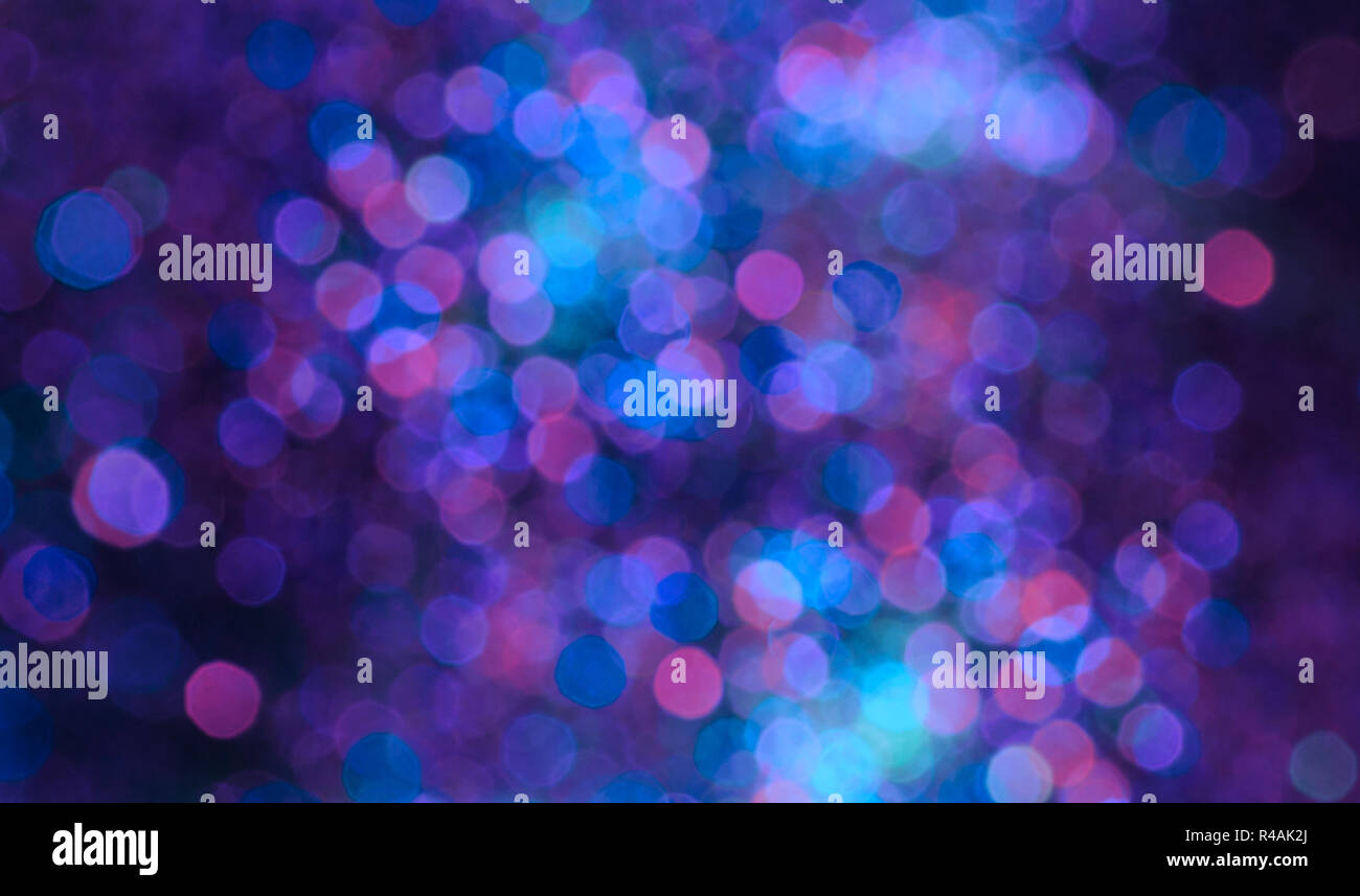 Defocused abstract multicolored bokeh holiday lights background. Stock Photo
