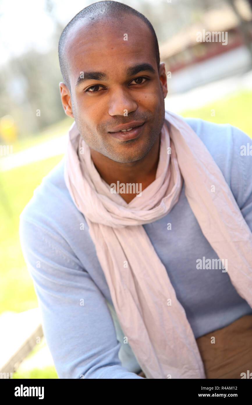 Portrait of smiling student at college campus Stock Photo - Alamy
