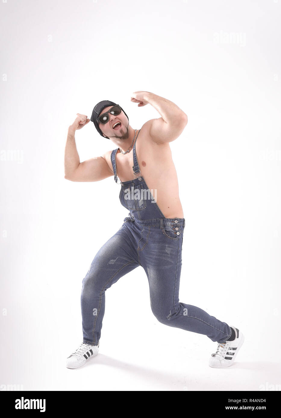nice man dancing break dance in the Studio .isolated on white Stock Photo