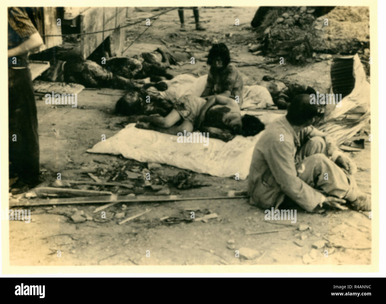 Hibakusha survivors victims of atomic bombing in devastated ruins wasteland, Hiroshima, Japan, 1945 Stock Photo