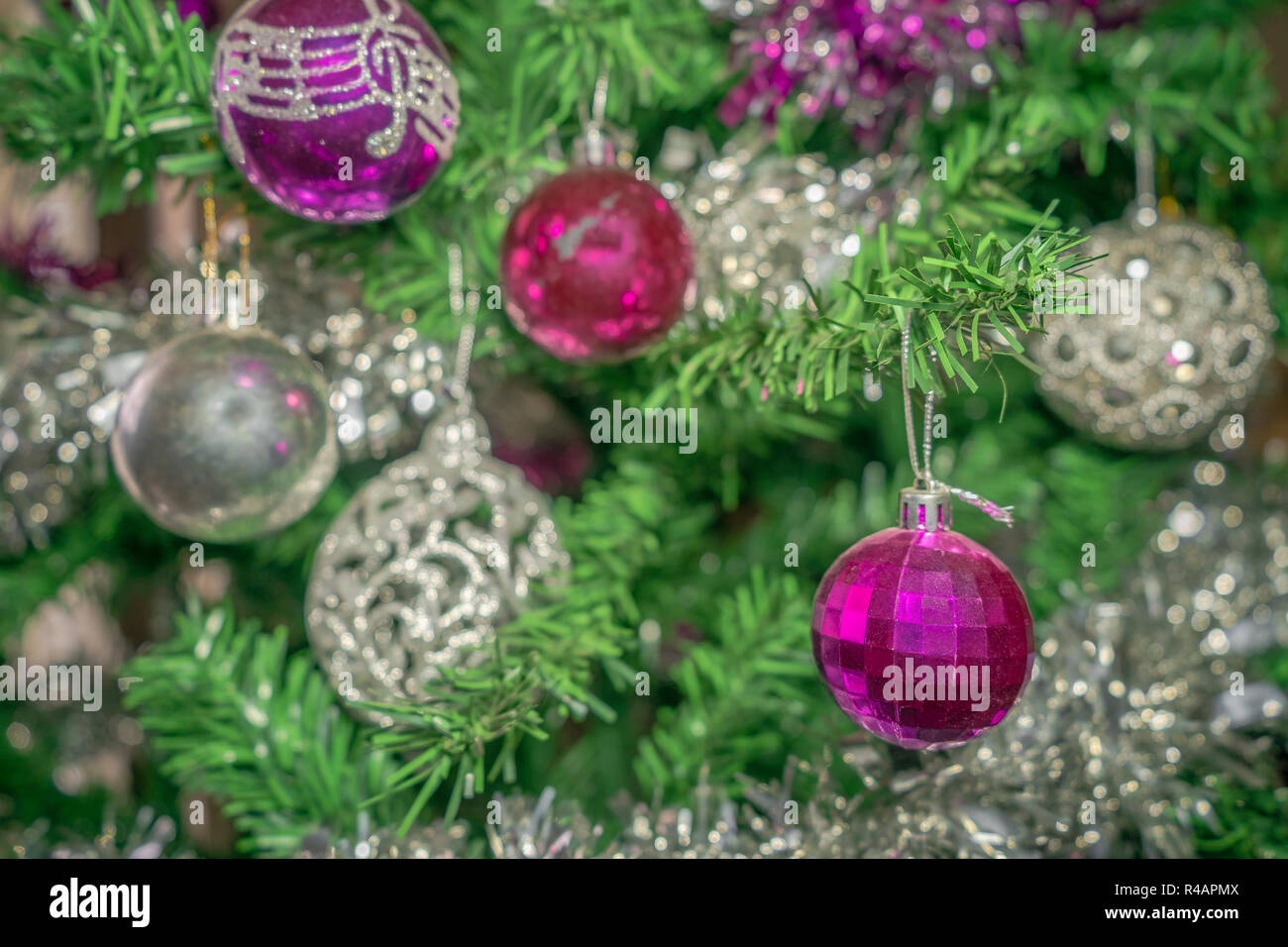 Twisted ornaments for Christmas tree violet and gray Stock Photo