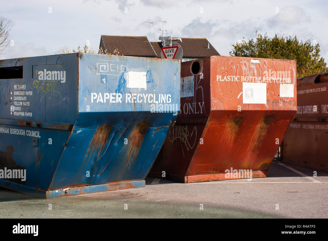 Large recyling skips in a car park Stock Photo - Alamy
