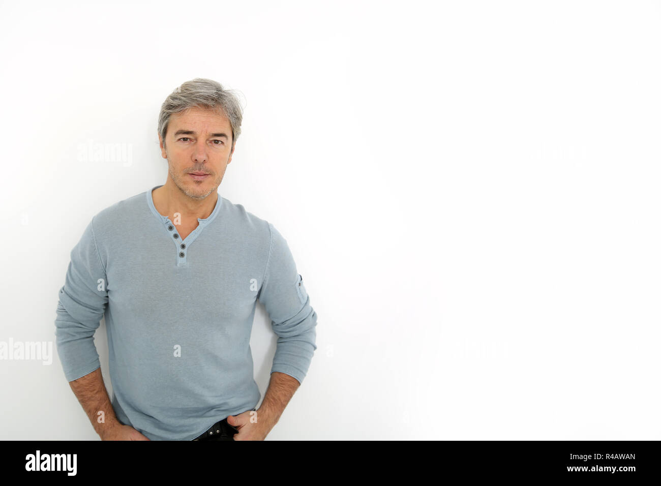 Mature handsome man standing on white background Stock Photo - Alamy