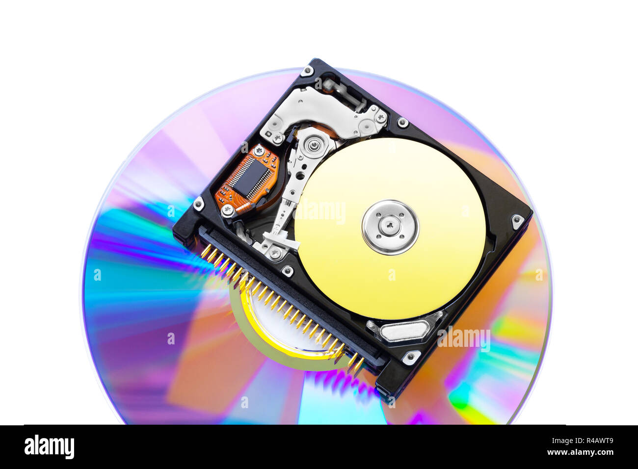 The compact hard disk form factor 1.8' with the lid open, lies on the optical disk. Stock Photo