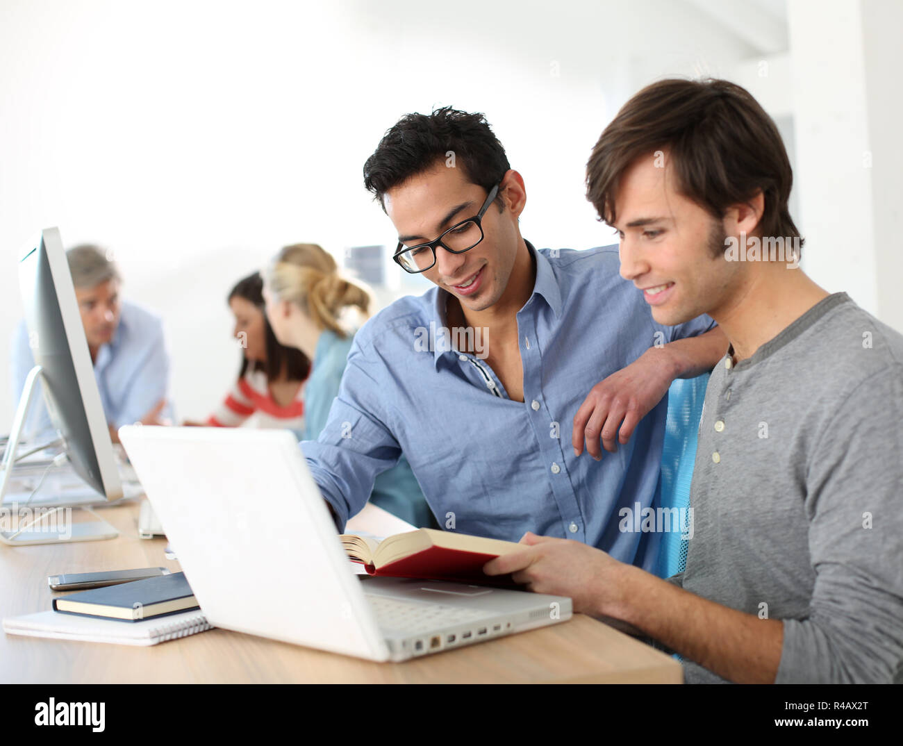College students working together on project Stock Photo