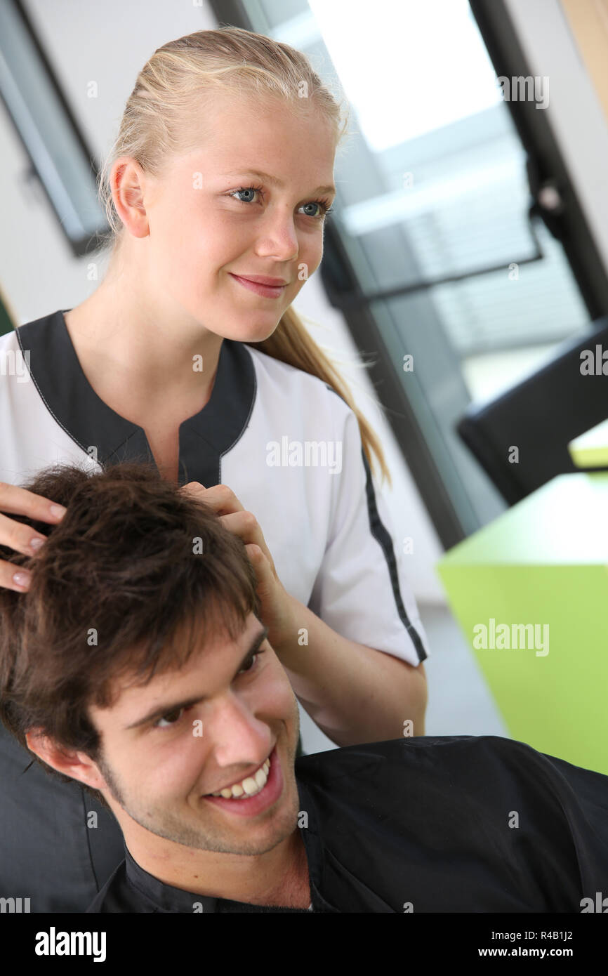 Portrait of hairdressing student girl in hair salon Stock Photo Alamy