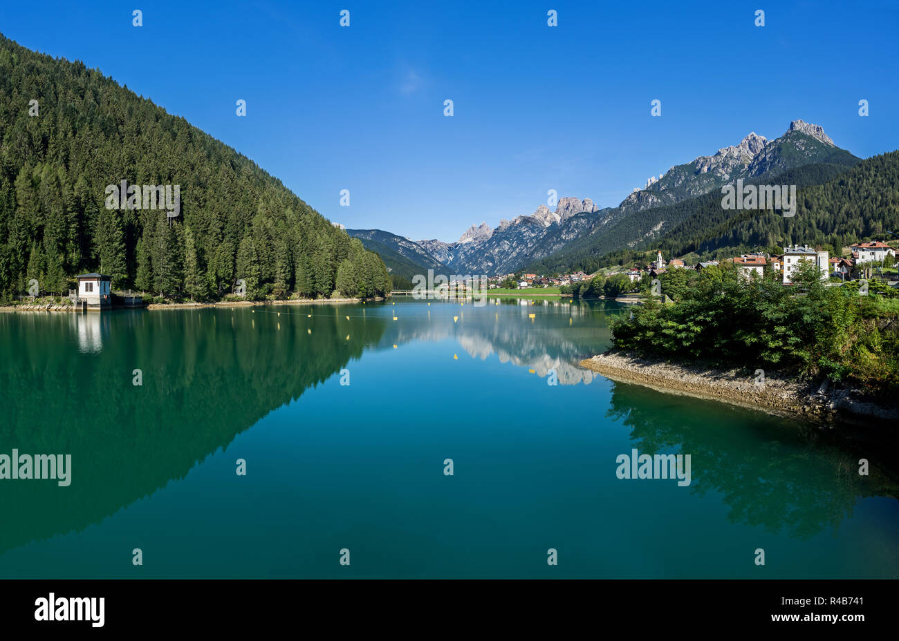 The artificial lake near the village of Cadore in Italy, created by the dam of Santa Caterina. Region of the Dolomites. Stock Photo