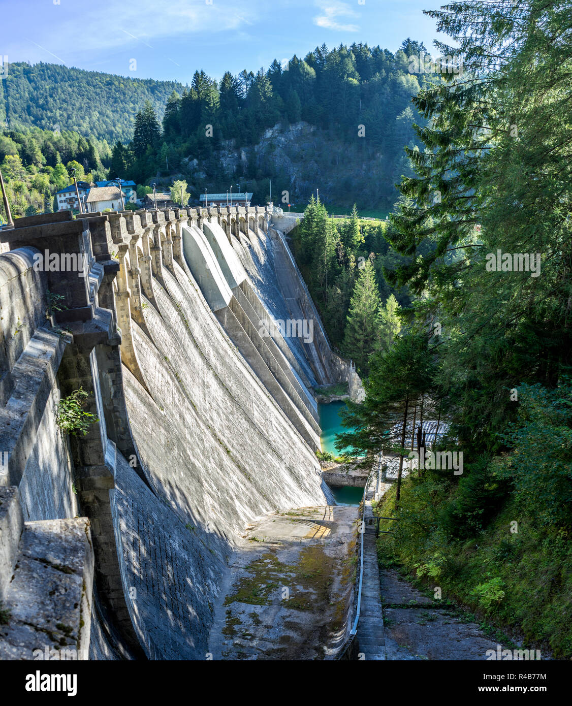 The dam of Santa Caterina near the village of Cadore, in the Dolomites, Italy. Hydroelectric plant. Stock Photo