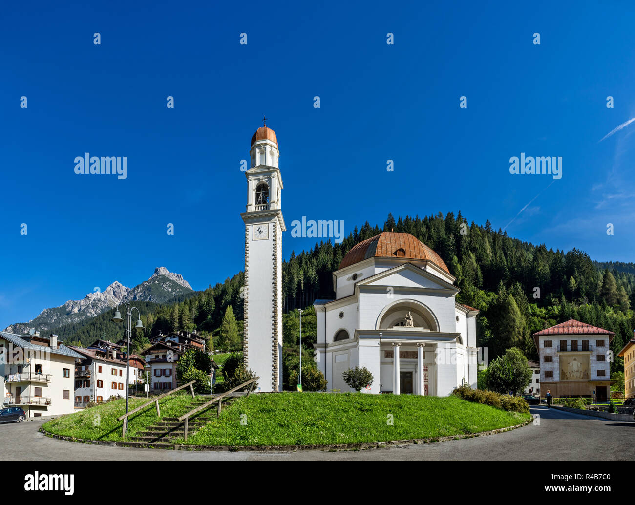 A church in the village of Auronzo di Cadore in the Dolomites region of Italy. Stock Photo