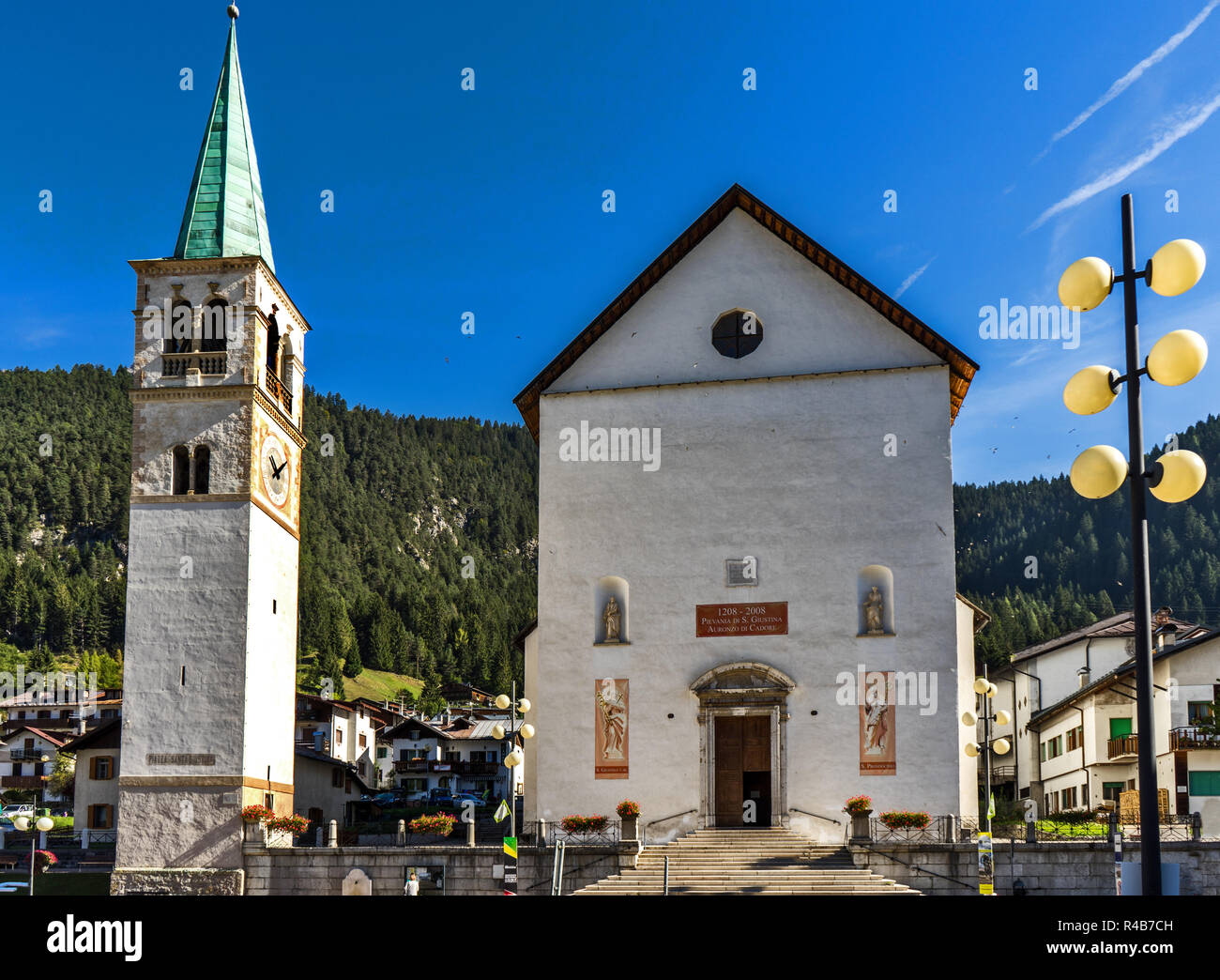 A church in the village of Auronzo di Cadore in the Dolomites region of Italy. Stock Photo