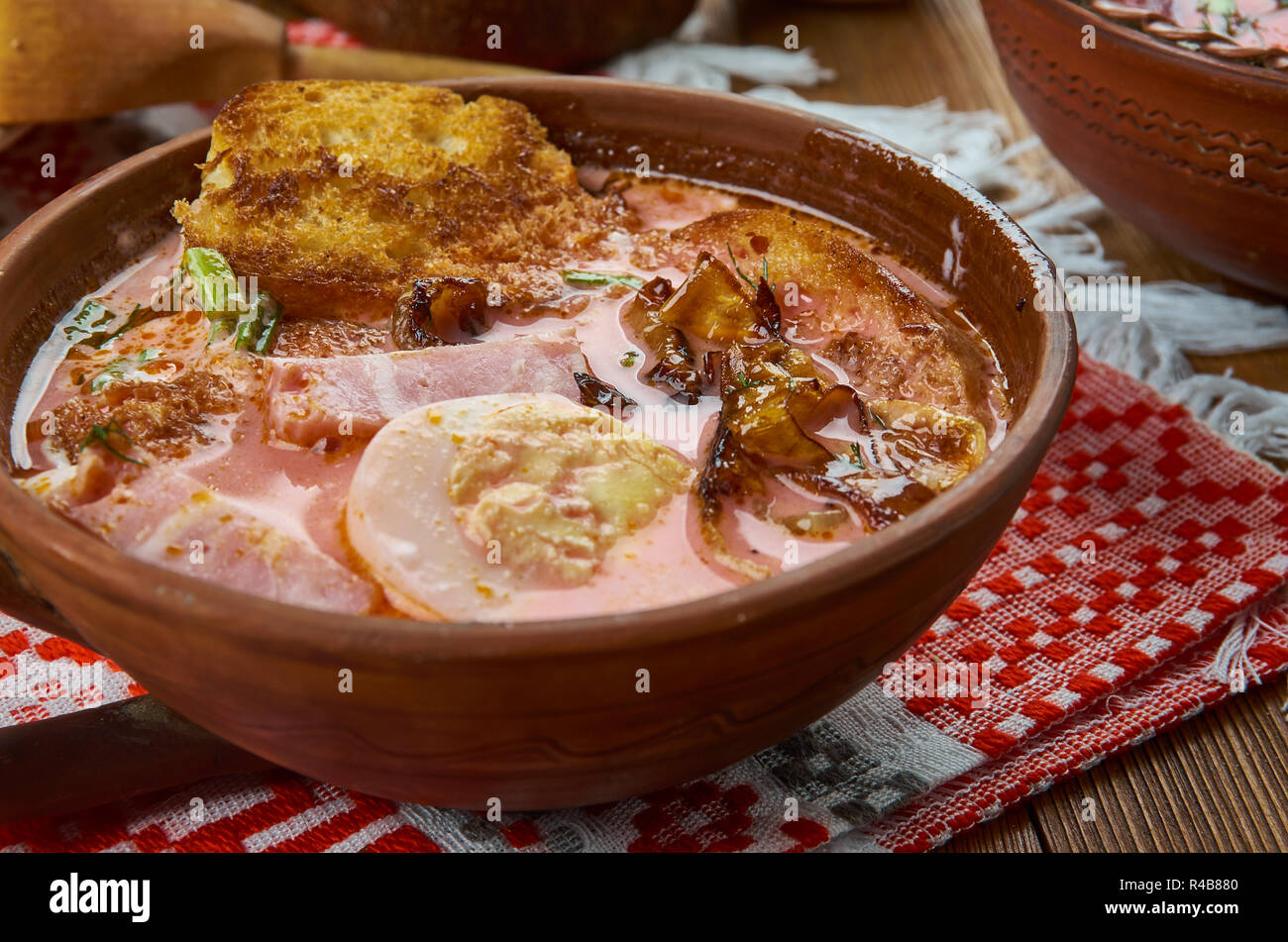 polivka, thick soup with ham and toast,  Belarusian  cuisine, Traditional assorted dishes, Top view. Stock Photo