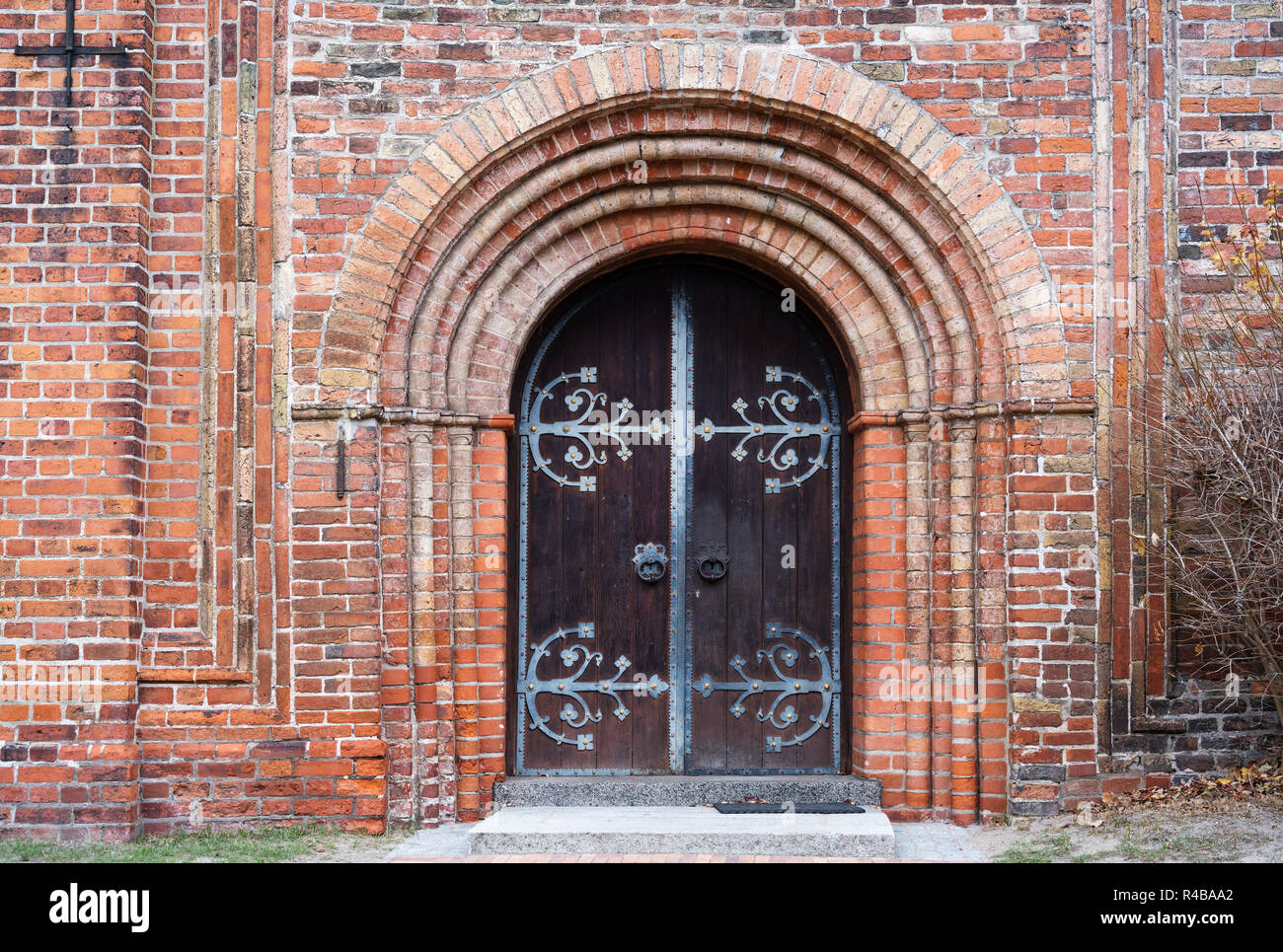 entrance door to the historic ratzeburg cathedral in typical brick architecture in north germany Stock Photo