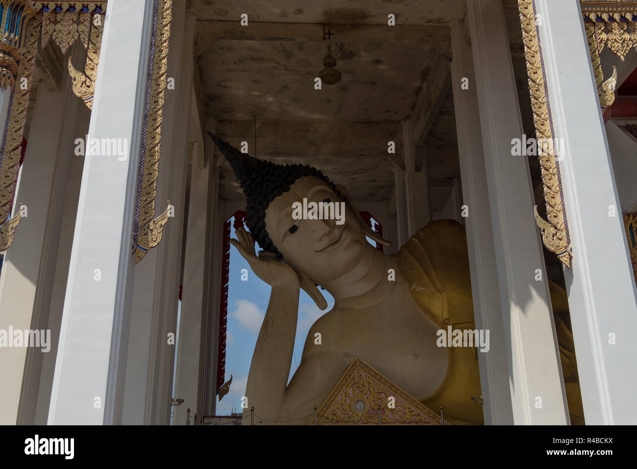 The Reclining Buddha Temple in Hat Yai, Thailand. Inside detail of the big Buddha head. Stock Photo