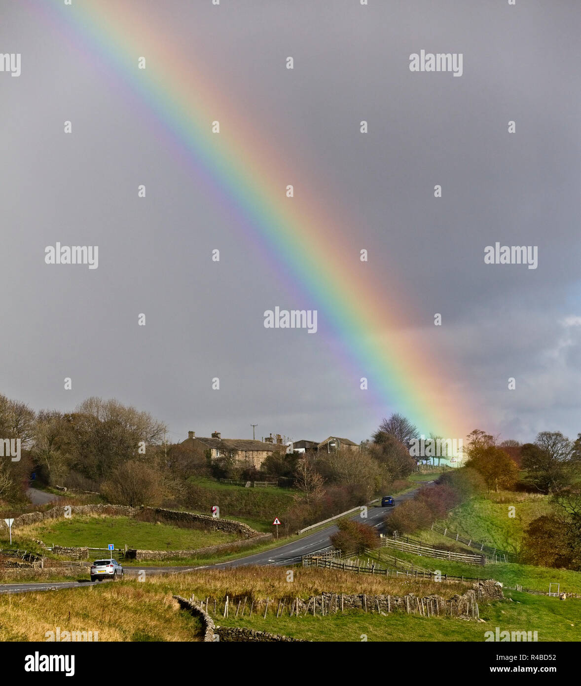 Rainbow over the A59 near Skipton, West Yorkshire, England, UK Stock