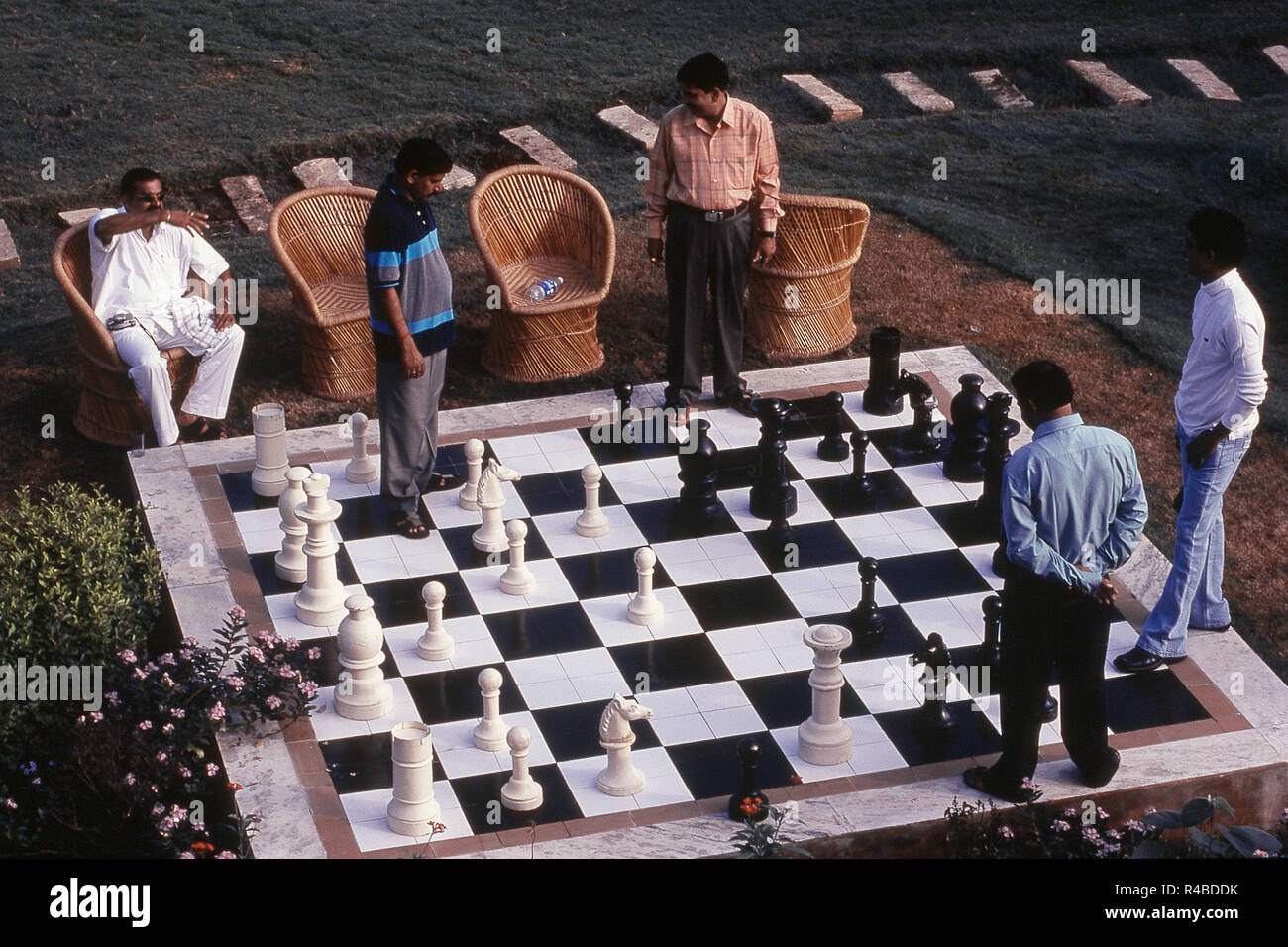 People playing on big chessboard, Sayla, Surendra Nagar, Gujarat, India, Asia Stock Photo