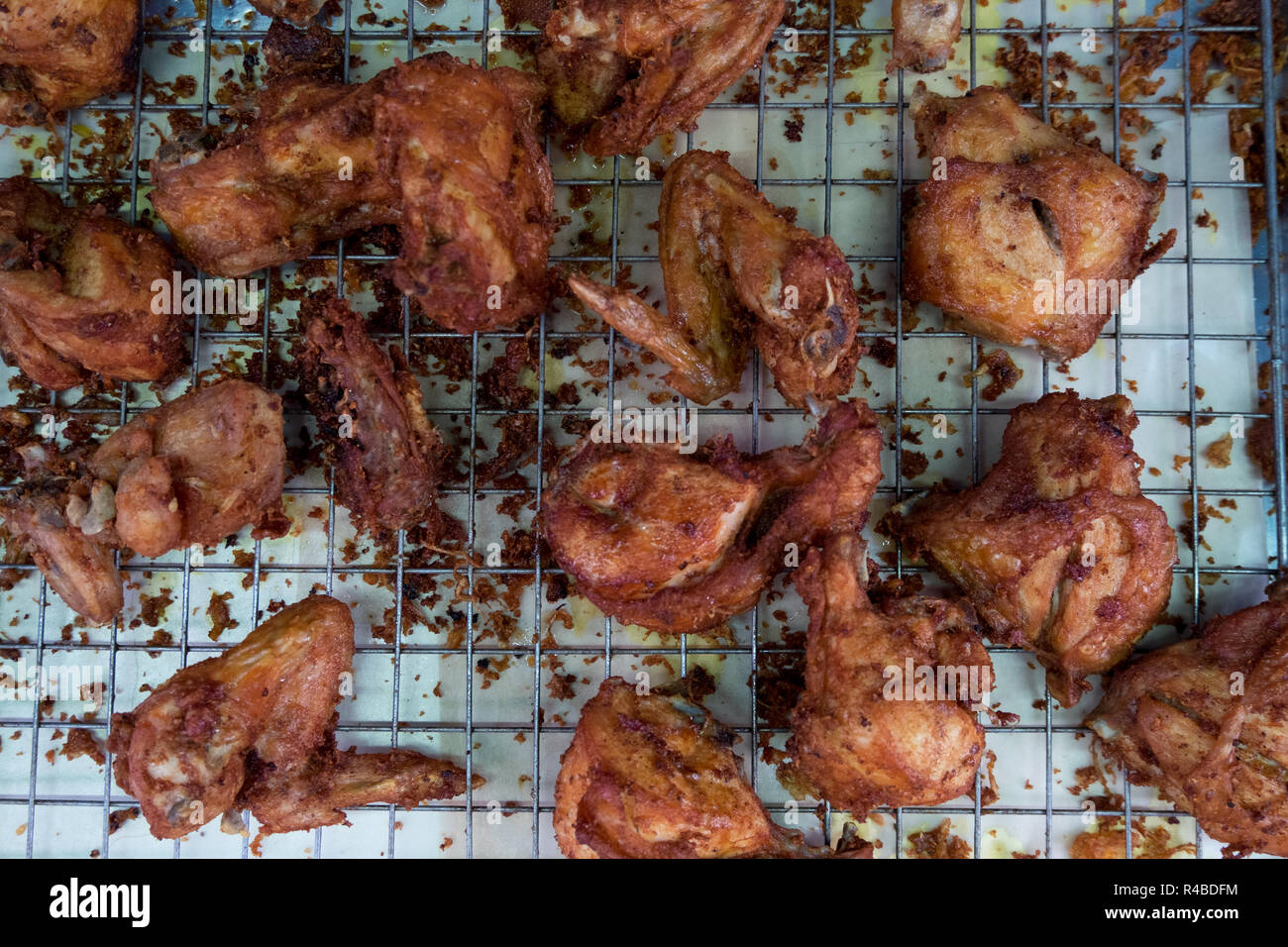 Fried chicken wings, fresh out of the fryer in Hat Yai, Thailand. Stock Photo