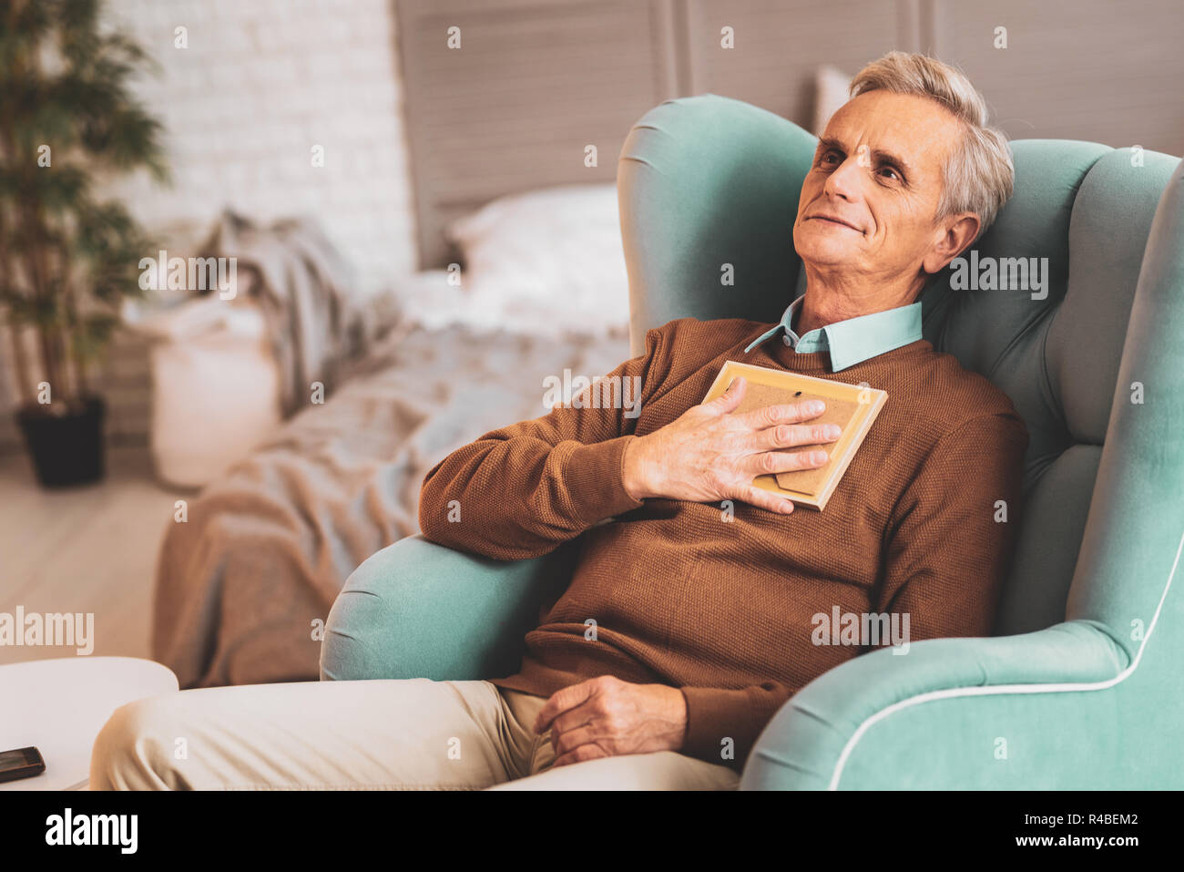 Family holidays. Happy retired man feeling very unforgettable after unbelievable summer family holidays Stock Photo