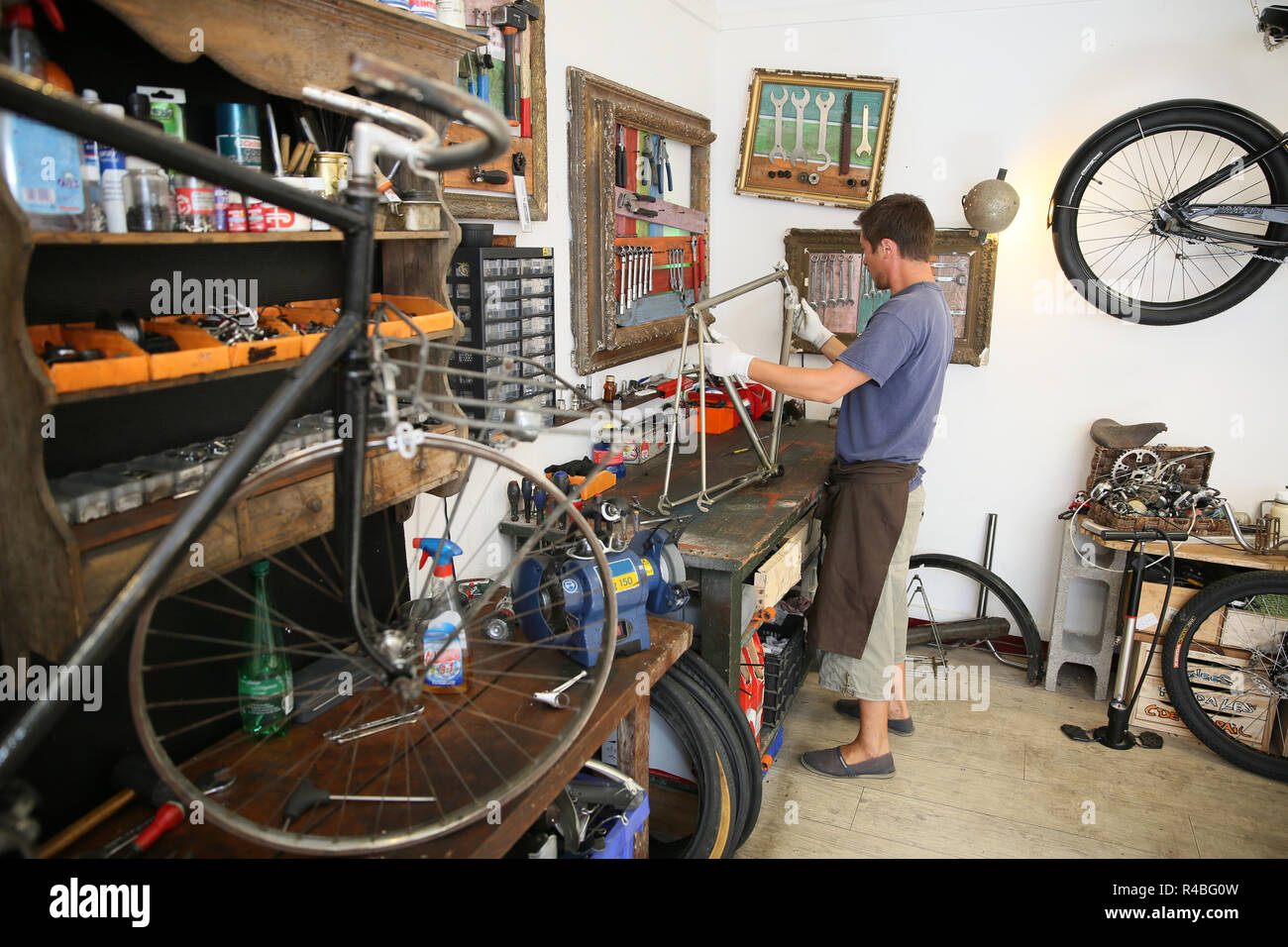 bike shop fixing bike frame Stock Photo 