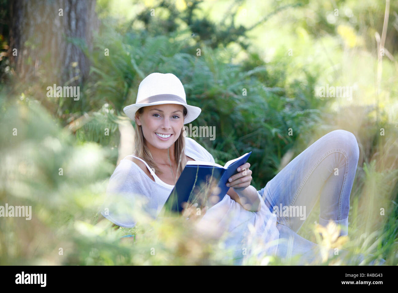 Cheerful girl years old reading hi-res stock photography and images - Alamy