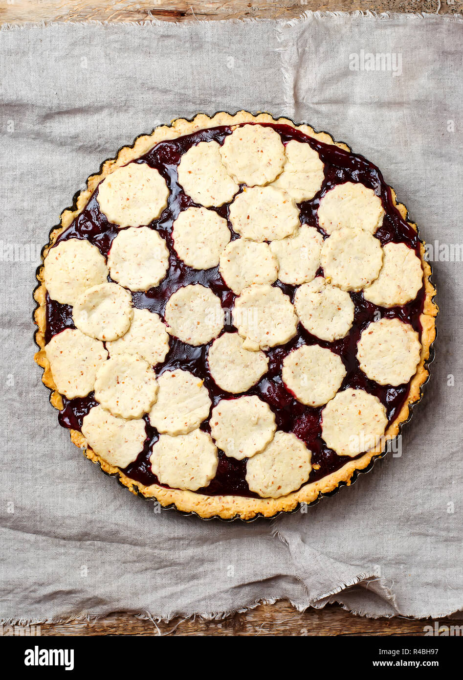 almond tart with cherry. top view. style vintage. selective focus Stock Photo