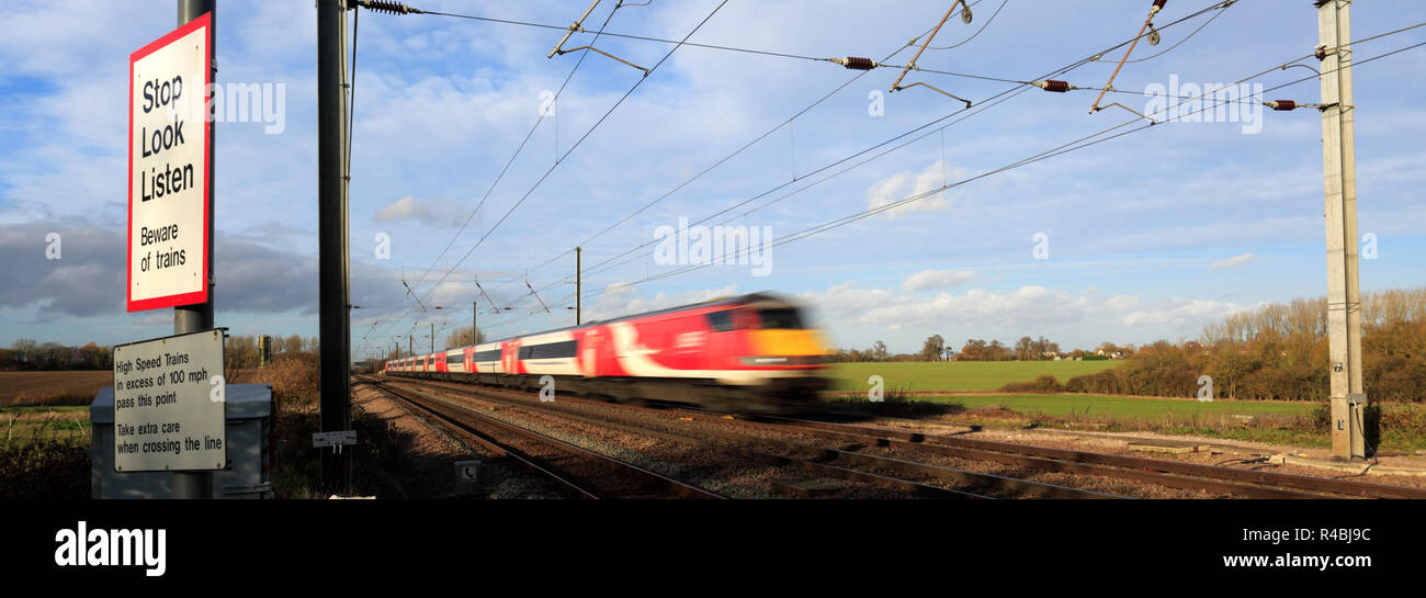 LNER train passing Stop, Look, Listen sign at an unmanned Level ...