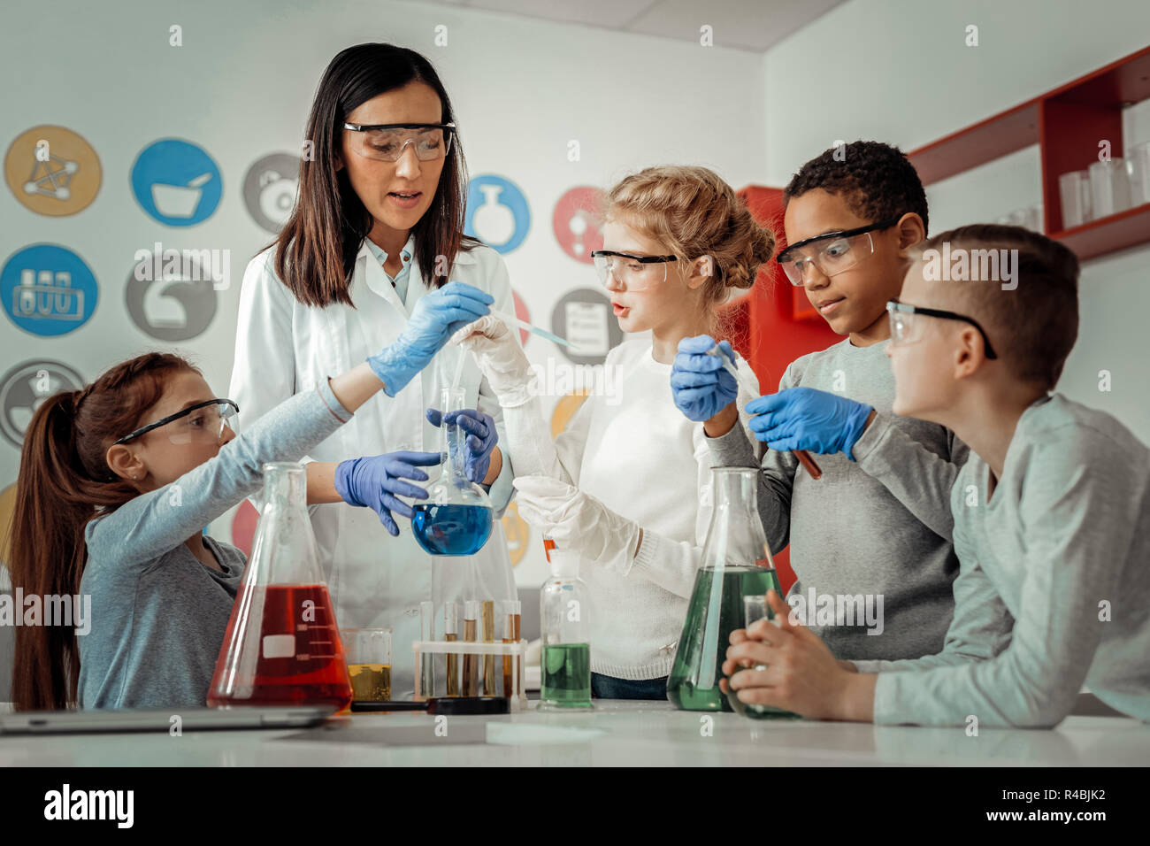 Just attention. Group of kids being well equipped while visiting practical lesson Stock Photo