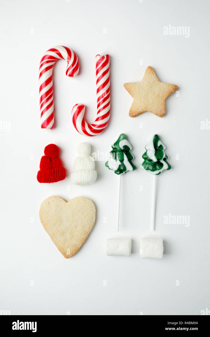 Christmas Decorations And Objects For Mock Up Template Design Christmas Candies Cookies Candy Cane Decorative Knitted Hat View From Above Flat L Stock Photo Alamy