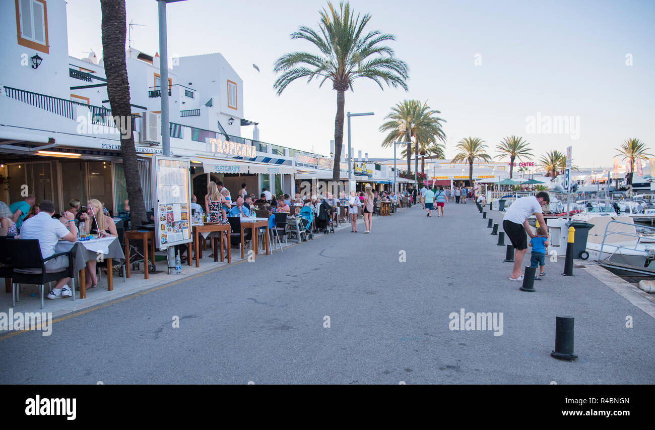 holiday people dining out on the popular calan Bosch marina .Ciutadella  Menorca Stock Photo - Alamy