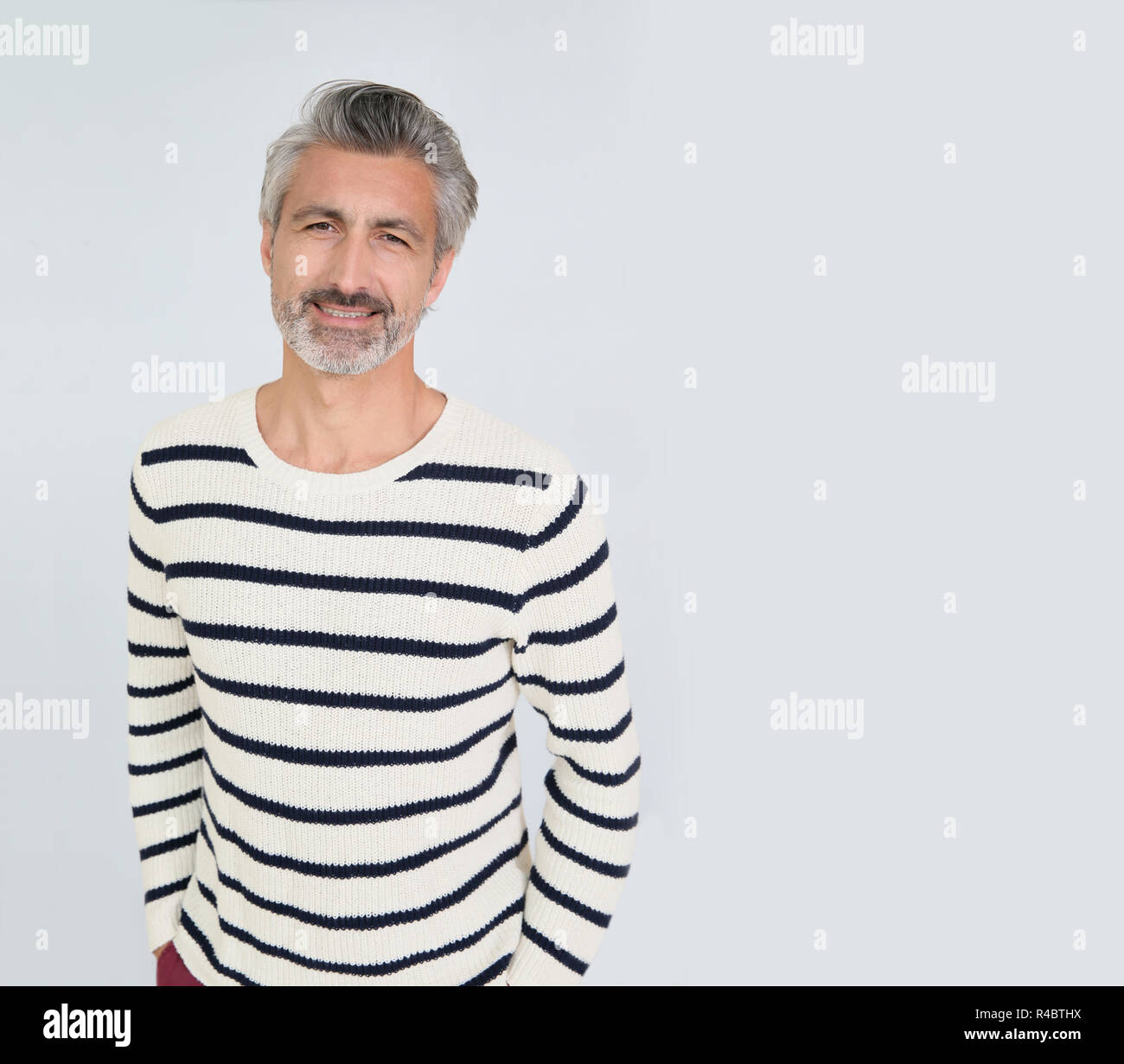 Portrait of handsome mature man on white background Stock Photo - Alamy