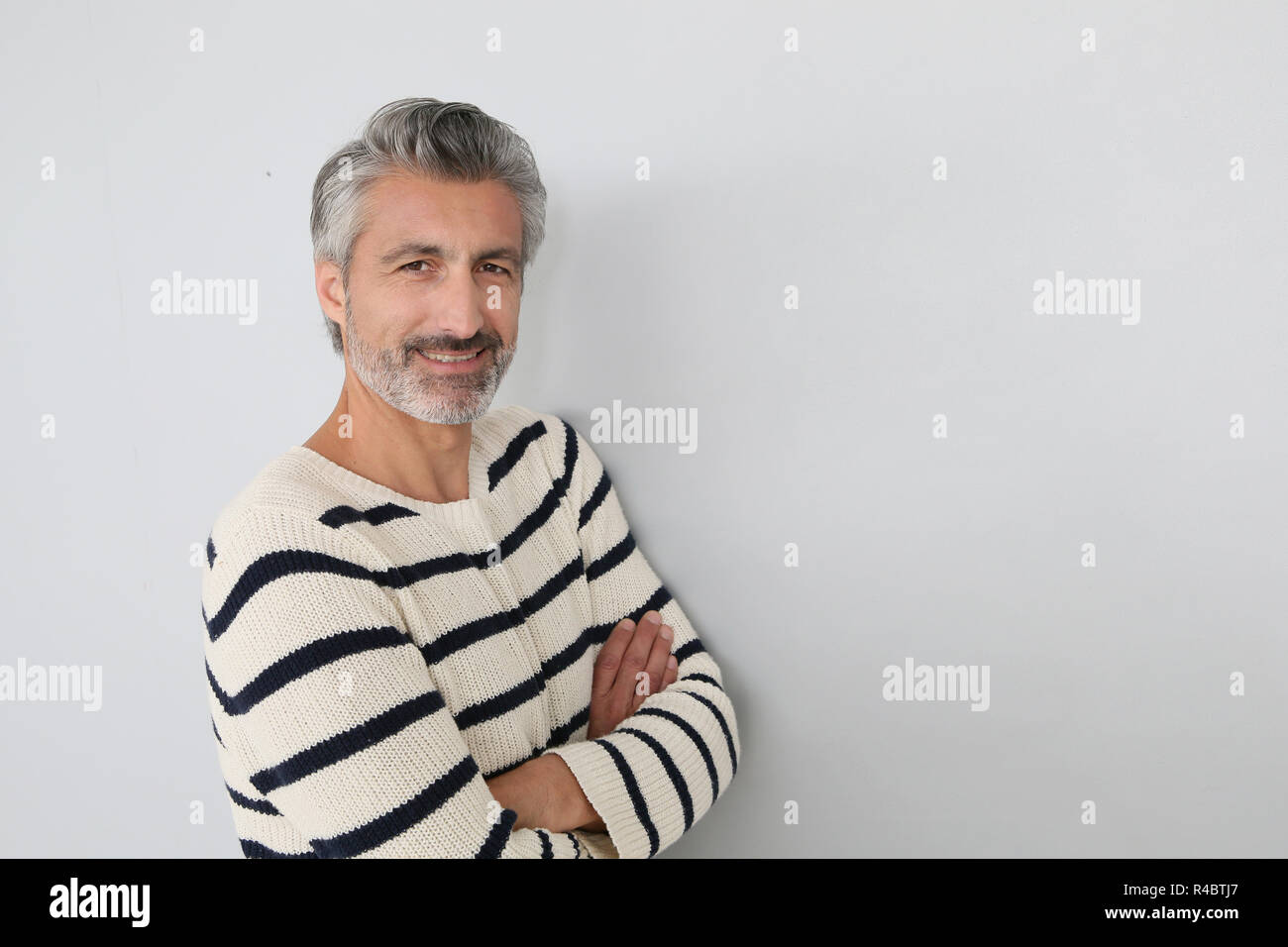 Portrait of handsome mature man on white background Stock Photo - Alamy