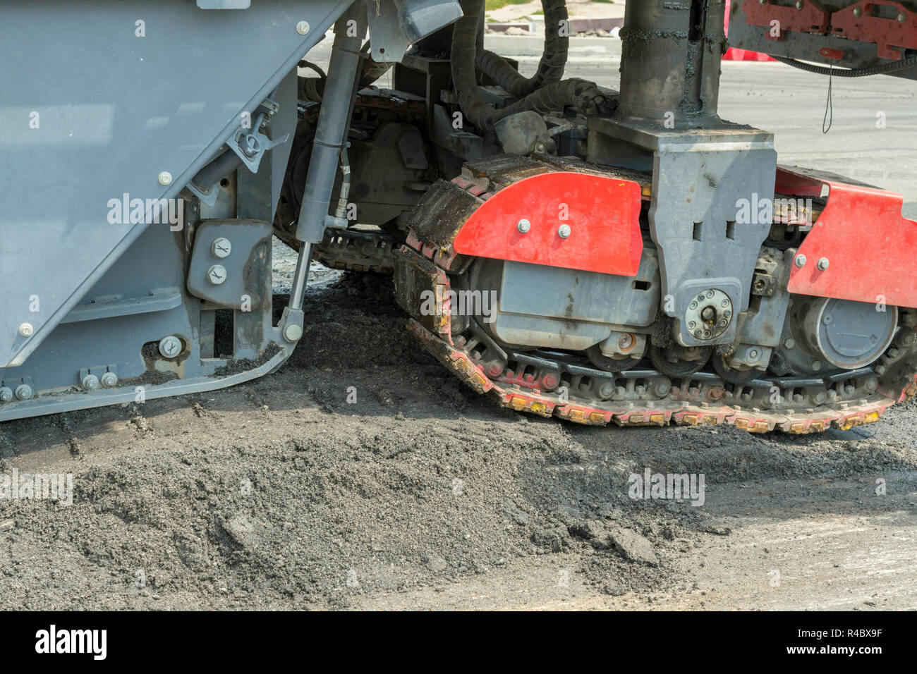 Machinery for asphalting roads. Close view on the workers and the ...