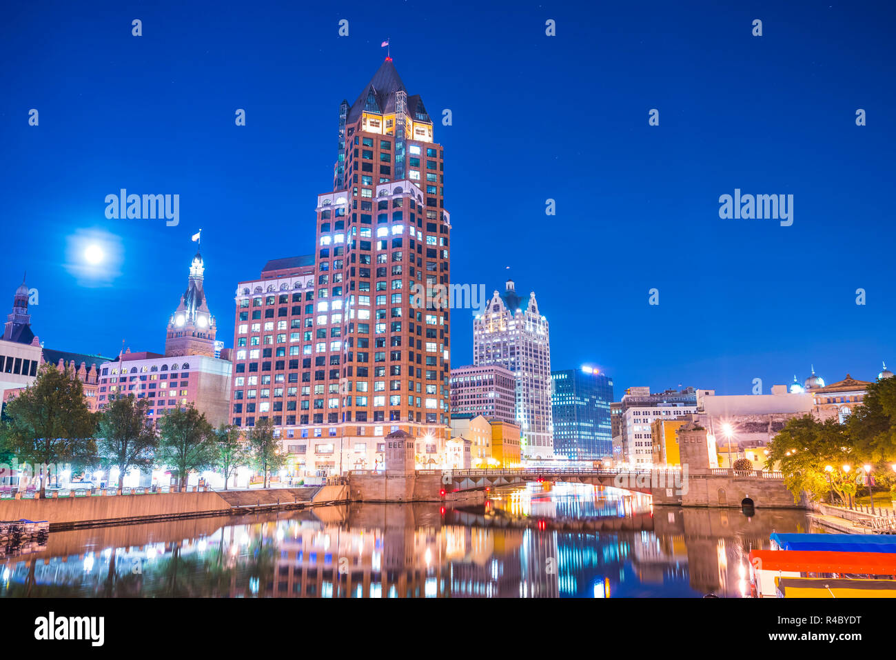 milwaukee downtown with reflection in water at night,milwaukee,wisconsin,usa. Stock Photo