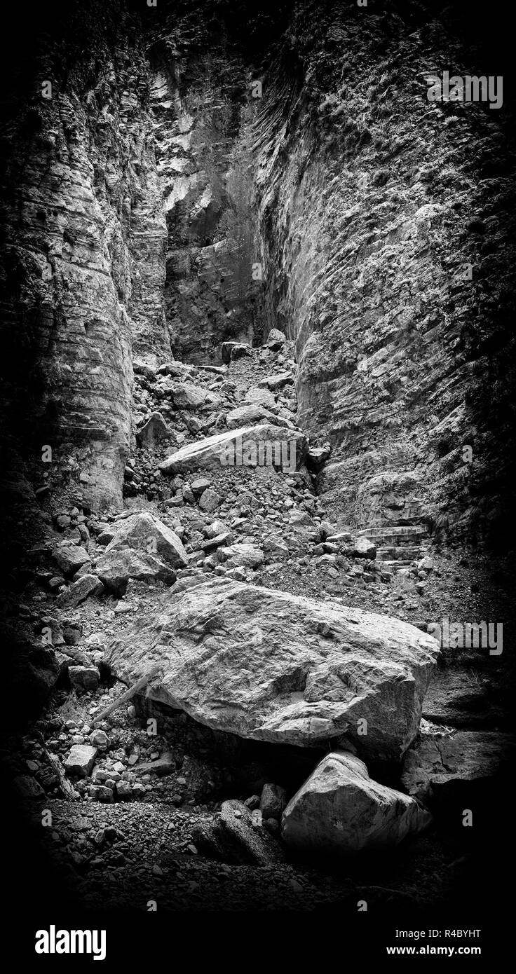 Vertical black and white landslide rock landscape Stock Photo