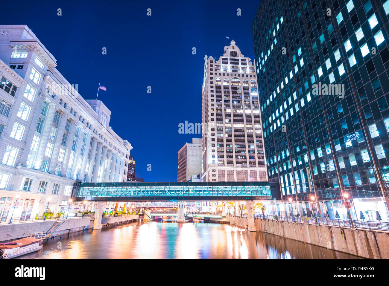 milwaukee downtown with reflection in water at night,milwaukee,wisconsin,usa. Stock Photo