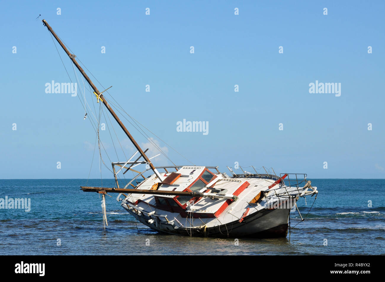 Sailboat run aground a Tipped Over Stock Photo