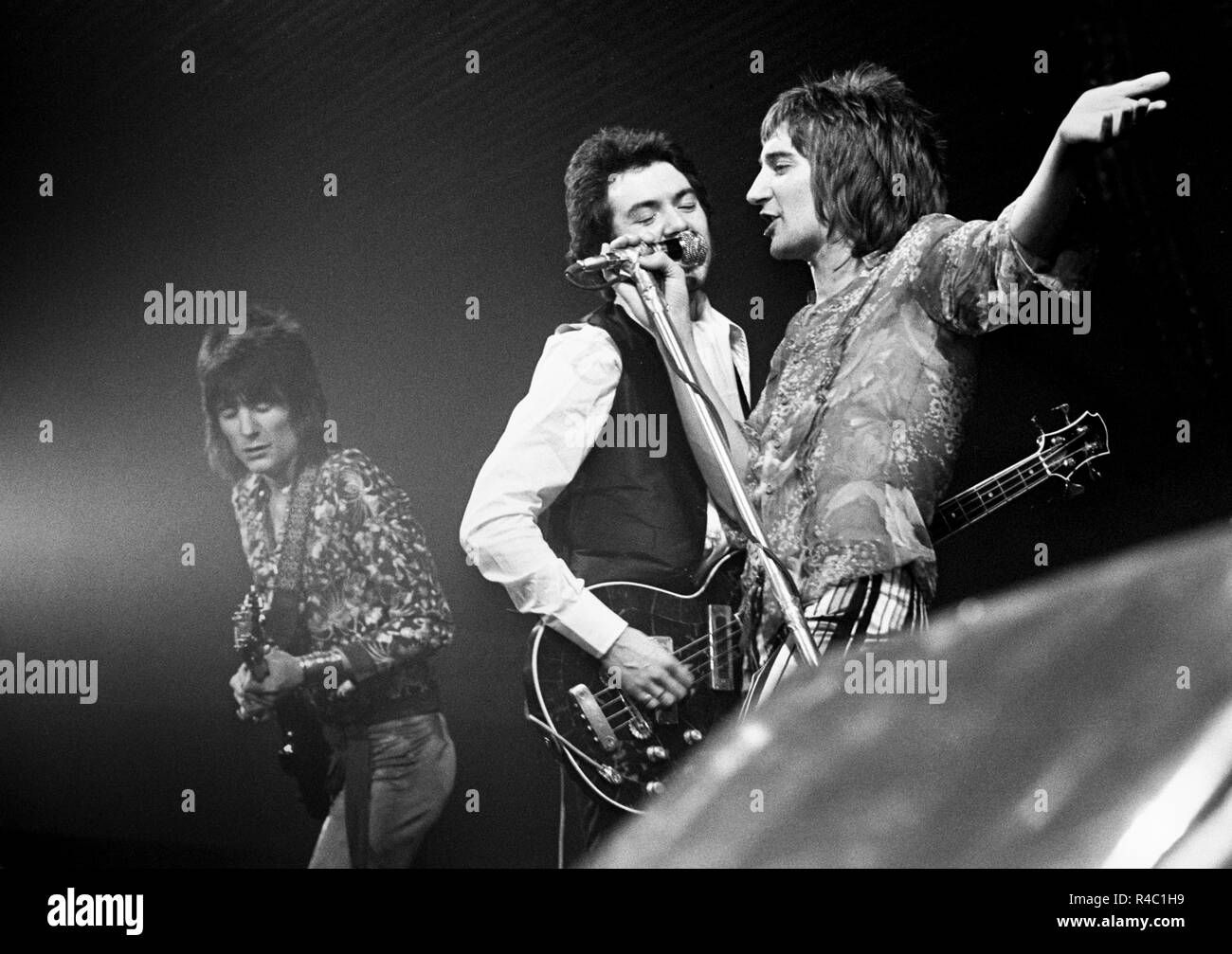Rod Stewart of the Faces with Ronnie Wood and Ronnie Lane perform on stage  on the Pop Gala TV show on 10th March 1973 in the Netherlands. L-R Ronnie  Wood, Ronnie Lane,